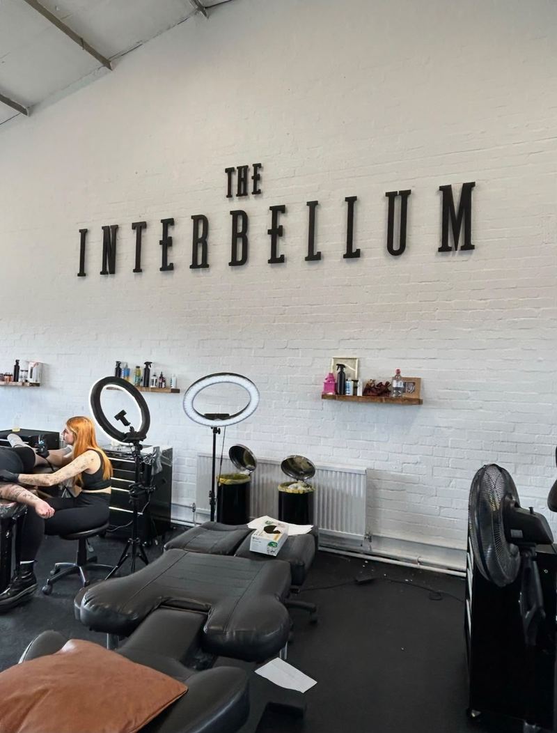 The Interbellum tattoo studio built-up wall lettering by Lauryn Jaime Ltd